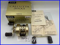 Shimano Calcutta 201XT Left-Handle Baitcasting Reel WithSpare 90mm handle WithBox